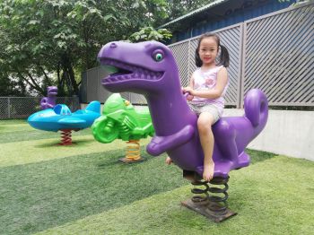 Thú nhún lò xo khủng long 